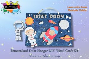 Introducing the Personalised Space Door Hanger DIY Wood Craft Kit by The Krafty Italian—a creative set featuring custom text like “LISA’S ROOM”, along with astronaut, rocket, planets, and stars designs. This kit includes customisable astronaut and planet cut-outs for a unique touch. Ideal for imaginative crafters and space enthusiasts, it’s the perfect DIY project to personalise any room. Pair it with other fun decor such as a Halloween sweet basket shelf sitter DIY kit for even more creativity!.
